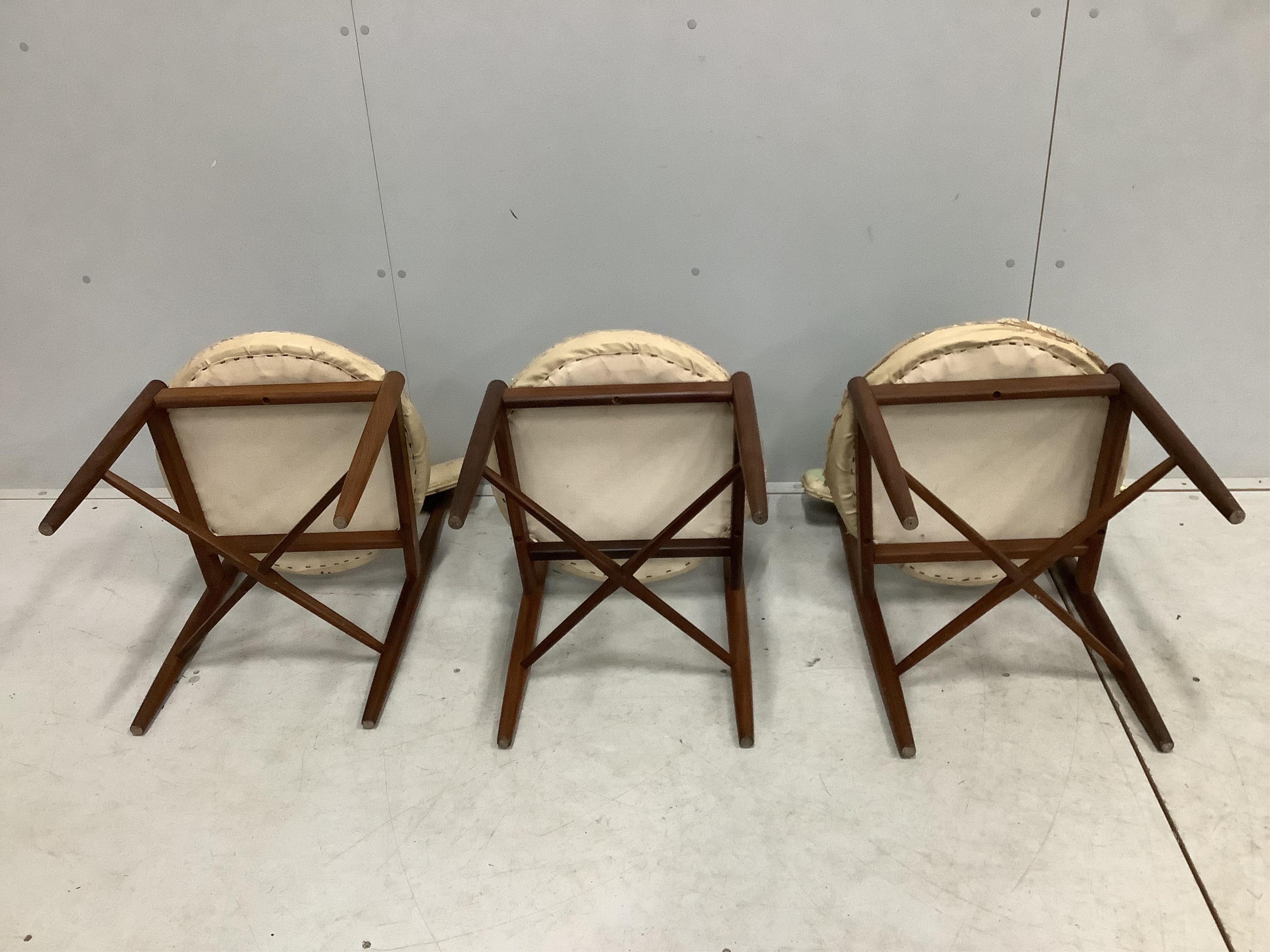 Three G-Plan teak dining chairs with circular seats. Condition - poor